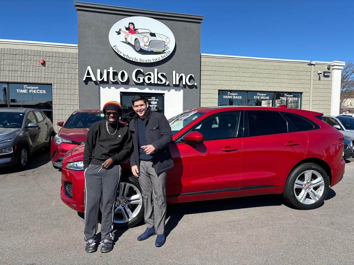 customer with salesman and new car