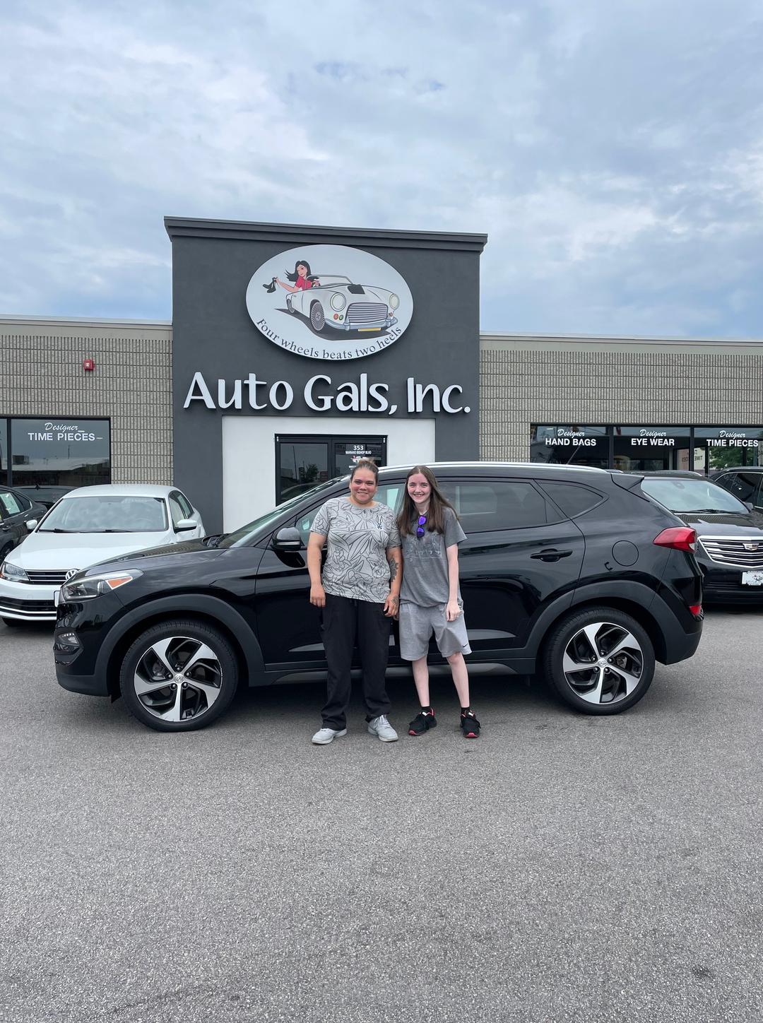 happy customer with their newly purchased Hyundai Tucson