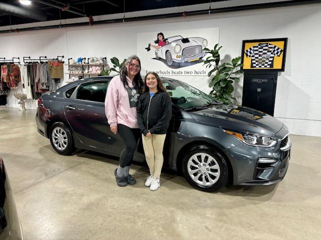customer and daughter and new car